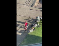 3 ladies in jerseys pretend to shoot a basketball 