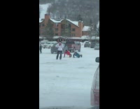 Two guys jacket pushup snow  parking lot