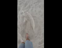 Guy stomp on sand make squeaky noise