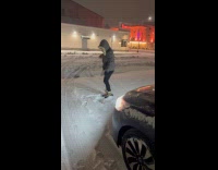 Woman gray hoodie dance  on snow night