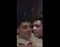 Guy kisses own face using filter