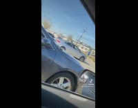 Girl throws soda cup spills in friends car 