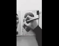 Guy draws sketches mike tyson pen notebook 