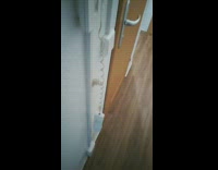 Water comes out of the intercom on the wall 