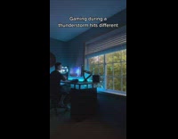 Guy plays video games during thunderstorm 