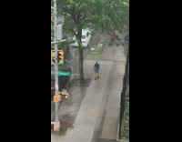 Red car gets stuck during storm 