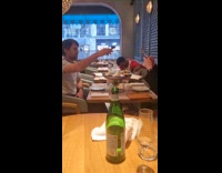 Man and Woman pictures their restaurant food