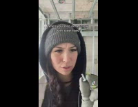 Woman pulls out screw from boot 