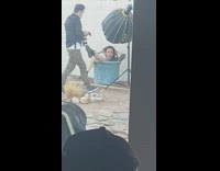 Woman model inside green bucket photo shoot