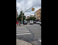 White limo truck turns slowly on road