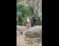 Family dance on mountain with energetic dad