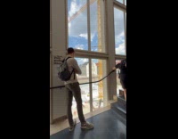 Guy film friends watch over construction site