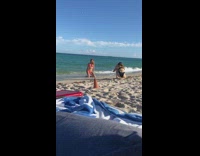 Woman red bikini different kneel pose beach