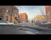 Guy plays baseball in middle of road