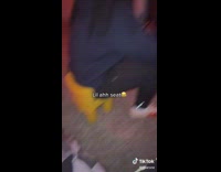 Big guy sitting in tiny small yellow toy chair