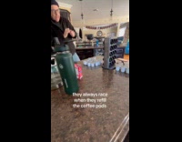 Couple racing in refilling coffee pods