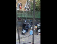 Man clean and get trash along the street in new york 
