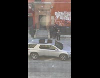 Police officers arrest woman on street who screams rape for attention