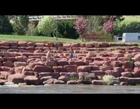 Woman white bikini photo shoot red rocks riverside