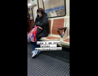 Lady wears black face mask on subway 
