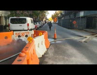 Fire hose connected from the street to inside building