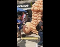 giant penis shaped balloons in street