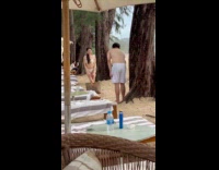 Collab IITW - Woman bikini poses with bag at beach