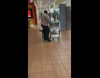 Lady black service dog shopping cart 