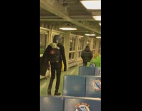 Guy walks with baby yoda in backpack 