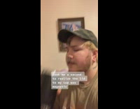 Guy struggling to drink from lid magnet 