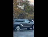 Collab WINY - Man cover leaking fire hydrant with barricade