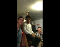 Girls in college dorm room sing "Year 3000" Jonas Brothers, guy shakes his head