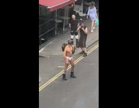 White underwear guy black duffel bag street 