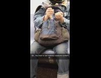 Guy clips nails on subway train