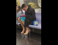 Fashionable Man in Inches-High Heels Commutes in Train