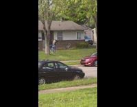 Girl black jacket roll over grass car