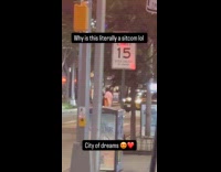 Man chases another guy with giant pole