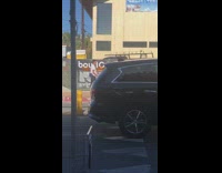 Guy red blue shirt skateboard jump street