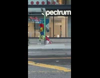 Girl green tights under blue shorts sidewalk