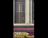 Chucky Doll Stares out Window at Streets 