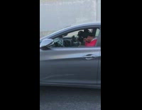 Two Guys Yell Inside Car Being Towed 