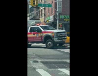 Ambulance crashed on road sign middle of intersection