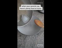 Purple shirt girl cooks eats ice cube