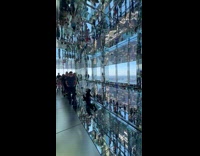 Woman in black outfit splits on the observation deck