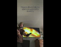 Guy checks girlfriends reaction while watching tv