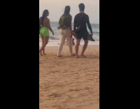 Couple intimate photoshoot at beach at sundown