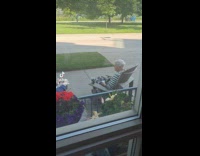 Man serves tea to elderly women