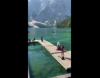 Two women dressed different photoshoot at lake