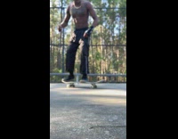 Skateboarder attempts trick but board hits his crotch