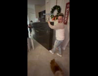 Surprising parents with 98 inch TV